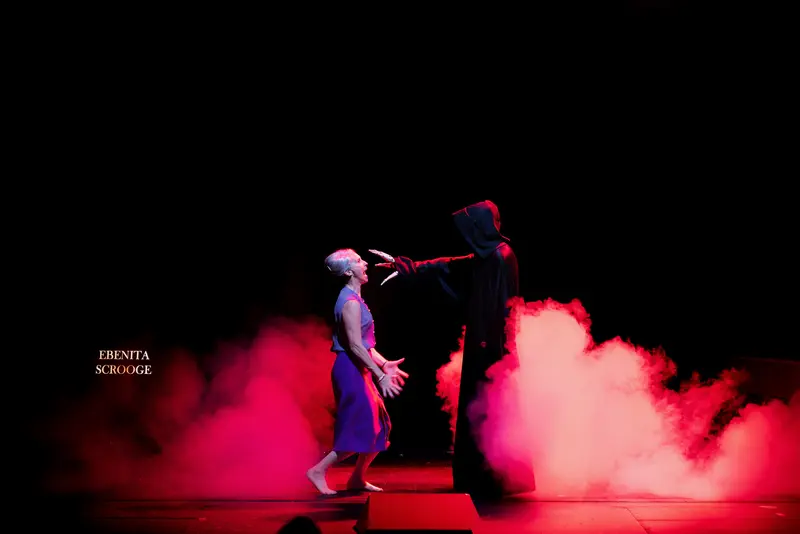 Dark Theatrical Moment from Miss Scrooge Performance at Kammerspielen