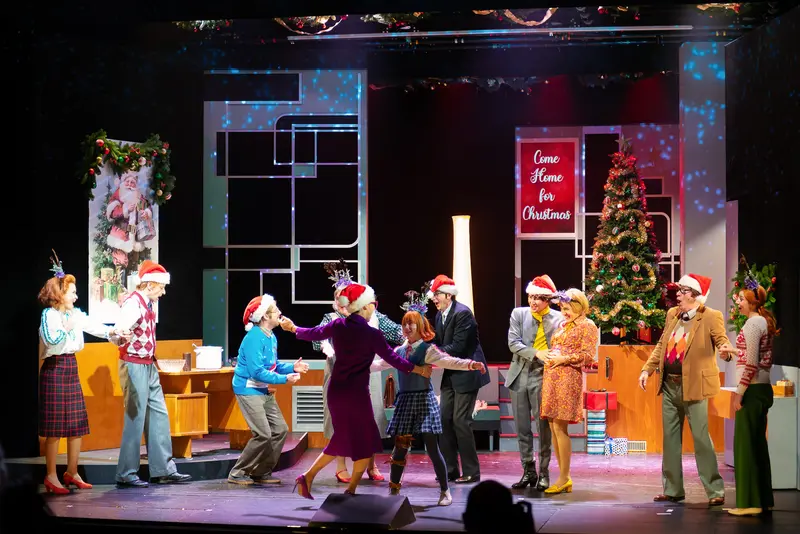 Miss Scrooge Theater Production: Festive Christmas Scene on Stage