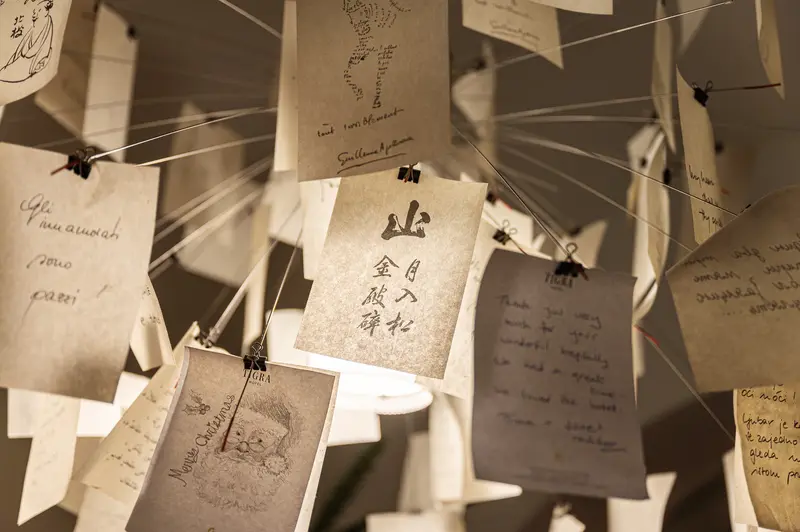 Vintage Notes and Memories Suspended on Interconnected Strings