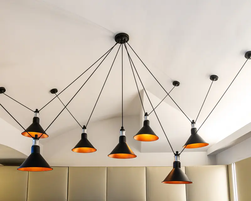 Industrial Modern Pendant Lighting with Black and Orange Geometric Design