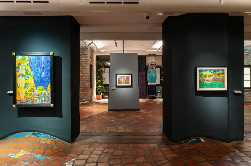 Contemporary Art Exhibition at Modern Gallery with Colorful Paintings and Mosaic Floor