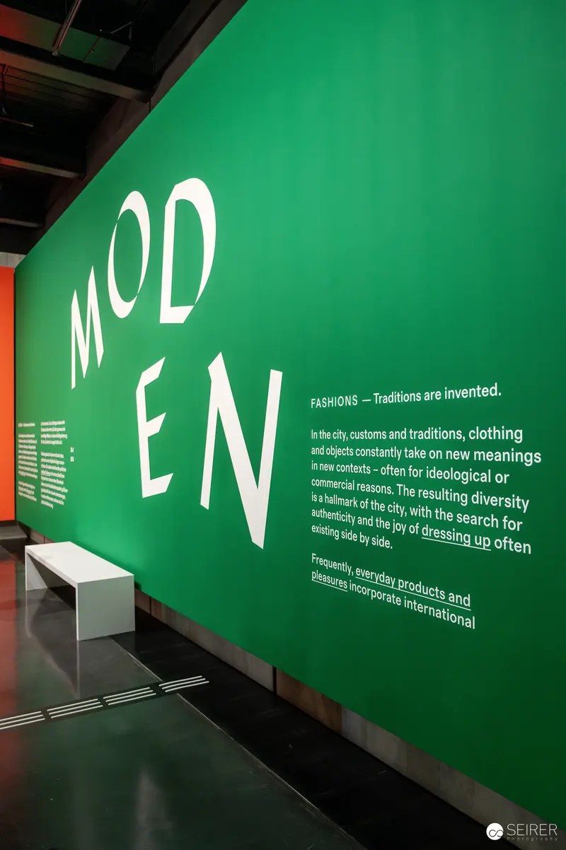Wien Museum 'MIXED' Ausstellungseröffnung. Green Exhibition Wall with "MODERN" Typography at Wien Museum Mixed Exhibition
