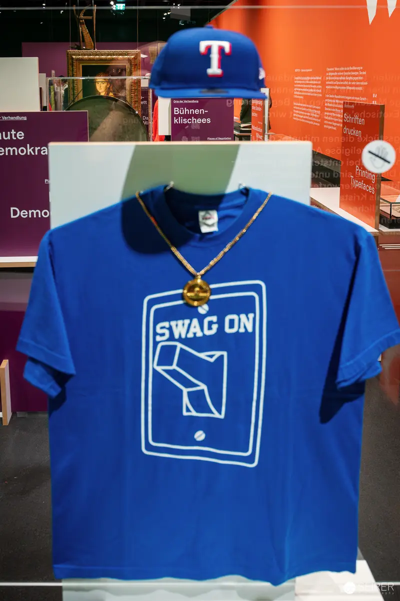 Wien Museum 'MIXED' Ausstellungseröffnung. Blue "Swag On" T-shirt Display at Wien Museum 'Mixed' Exhibition