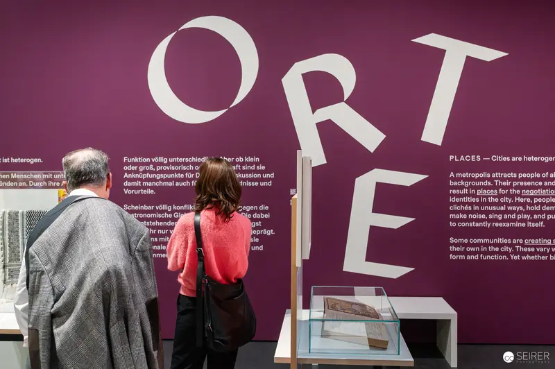 Wien Museum 'MIXED' Ausstellungseröffnung. Visitors Viewing Exhibition Wall Text at Wien Museum's 'Mixed' Exhibition