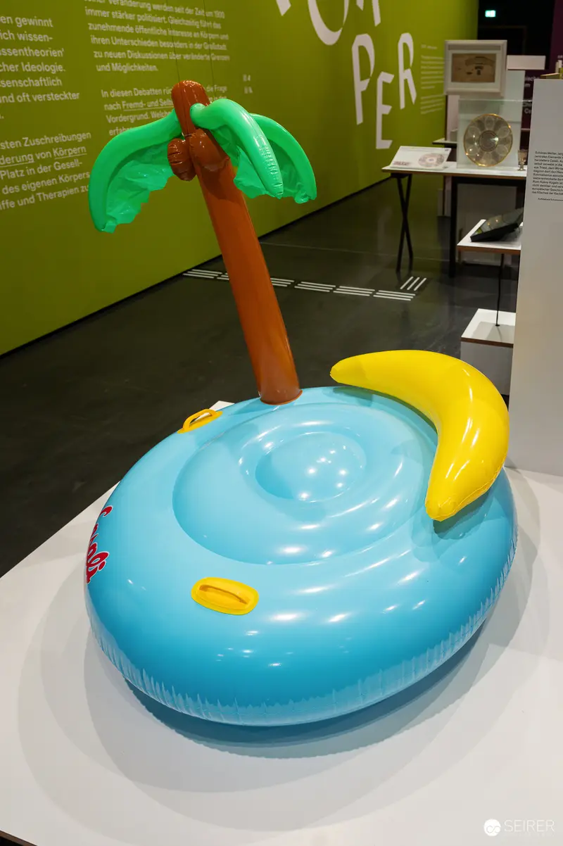 Wien Museum 'MIXED' Ausstellungseröffnung. Inflatable Pool Float with Palm Tree Display at Wien Museum Mixed Exhibition