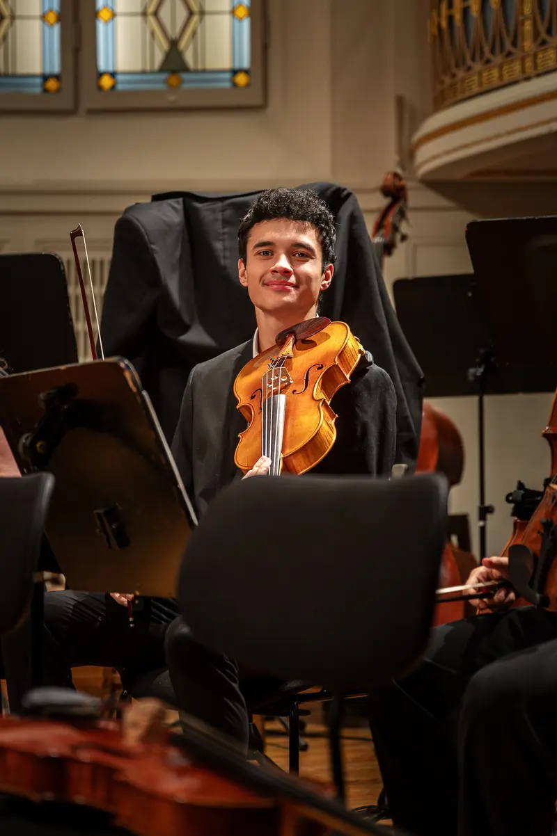 Young Violinist Performing at TU Orchestra Concert at Konzerthaus Wien