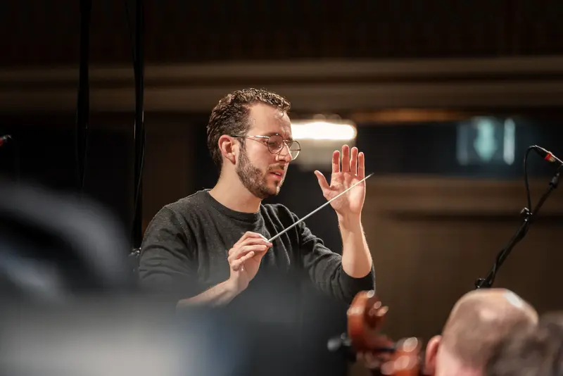 TU Orchestra Conductor Leading Performance at Konzerthaus Wien