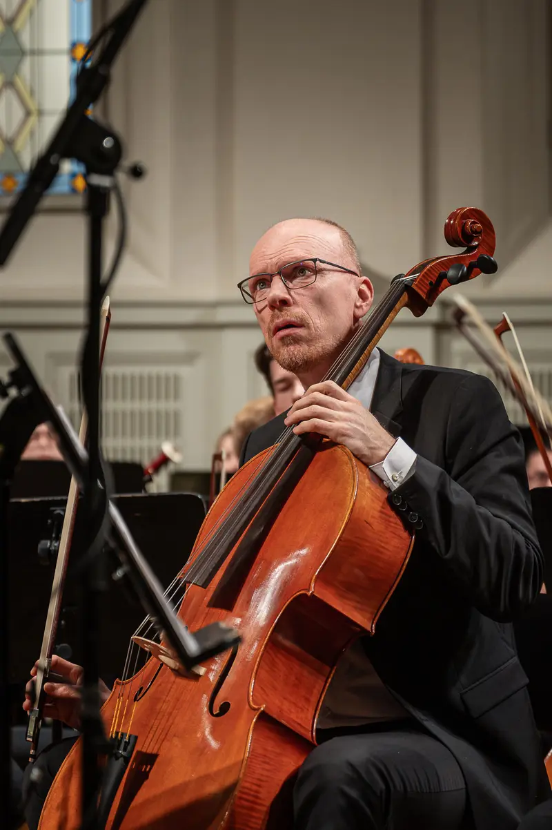 Cellist Performing at TU Orchestra Concert in Vienna Konzerthaus