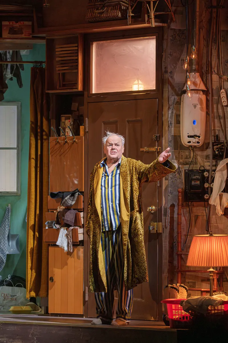Elderly Actor in Yellow Coat on Stage During "Sonny Boys" Theater Rehearsal