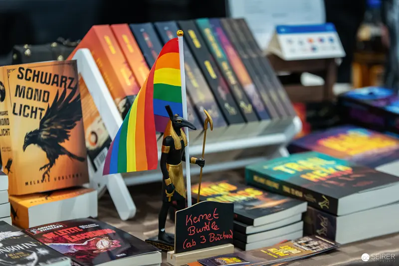 Pride Flag and Books at Vienna Book Display Highlighting LGBTQ+ Literature