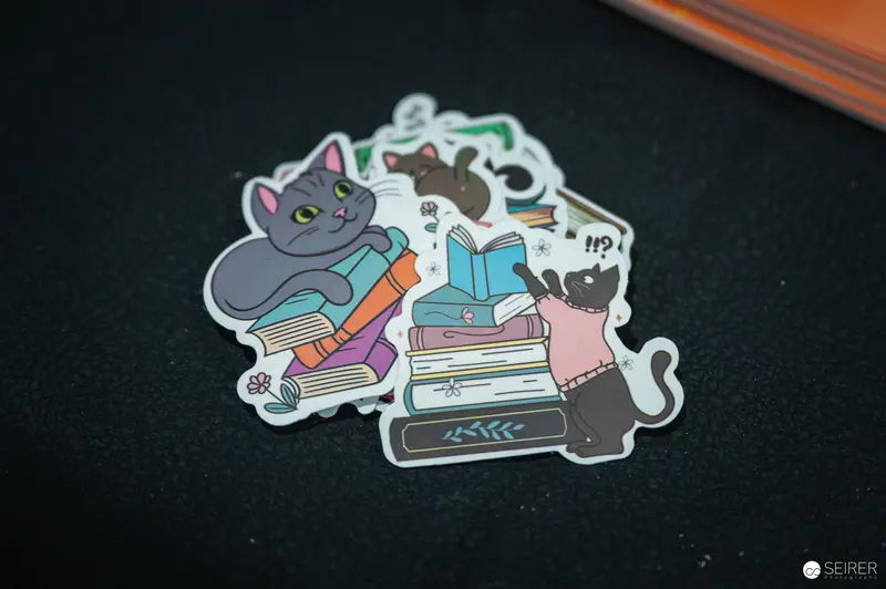 Cute Cats Reading Books Sticker Illustration on Dark Background