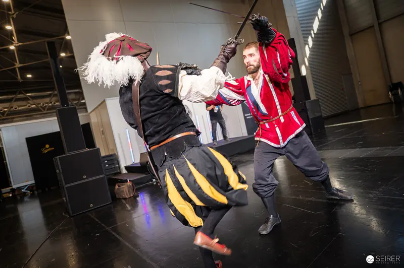 Cosplay Fight Scene at Vienna ComicCon 2024 Showcasing Dynamic Combat Performance
