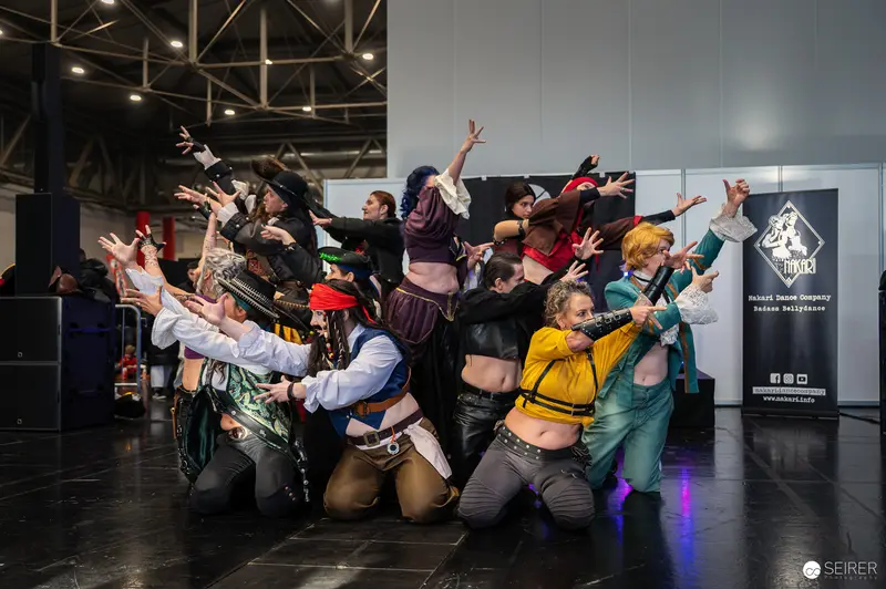 Cosplayers Strike Dramatic Poses at Vienna ComicCon 2024 Convention