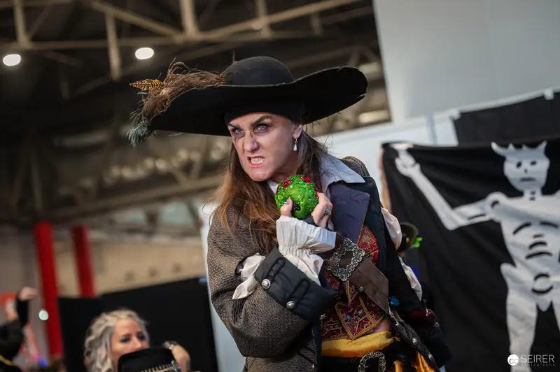 Pirate Cosplayer in Dramatic Pose at Vienna ComicCon 2024