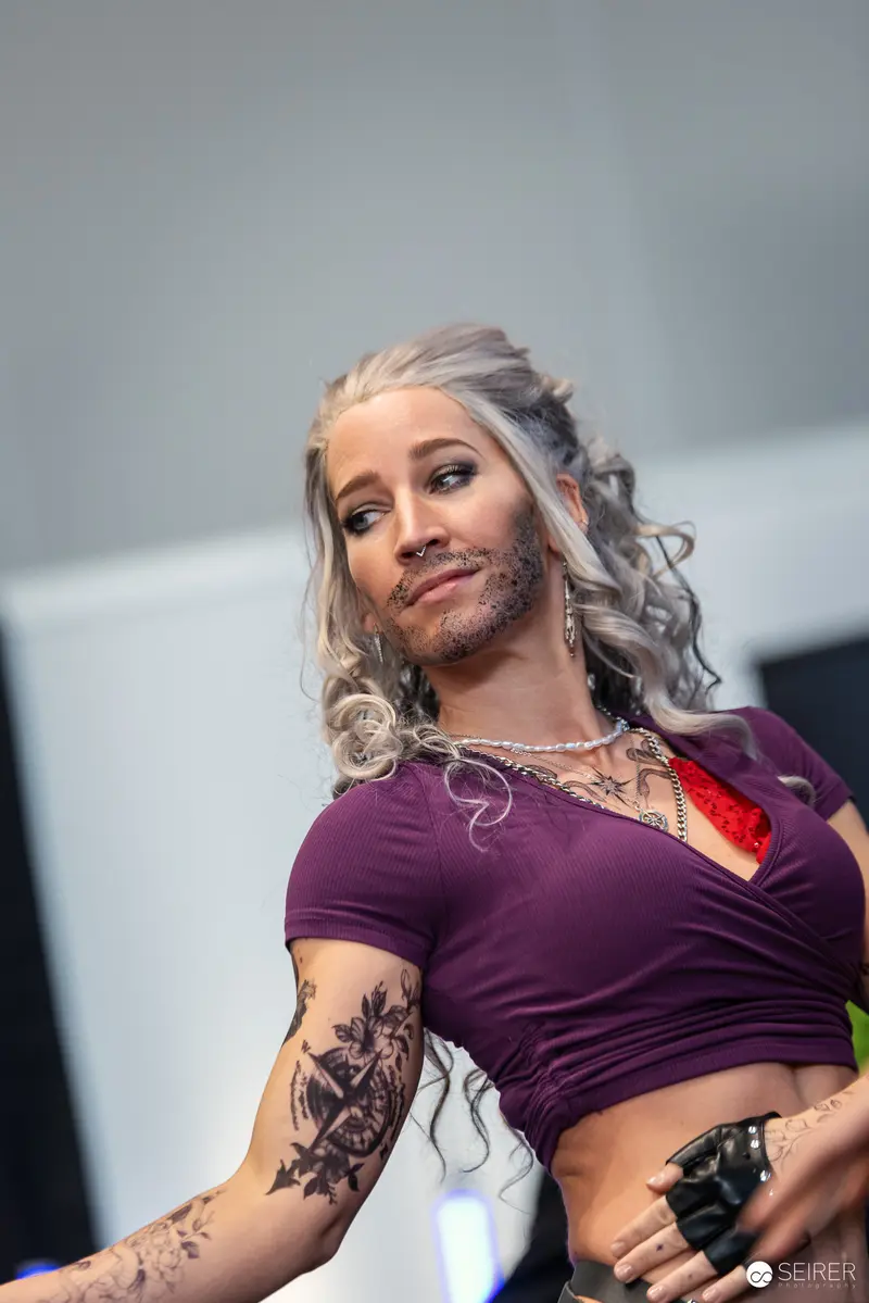 Cosplayer in Purple Top at Vienna ComicCon 2024