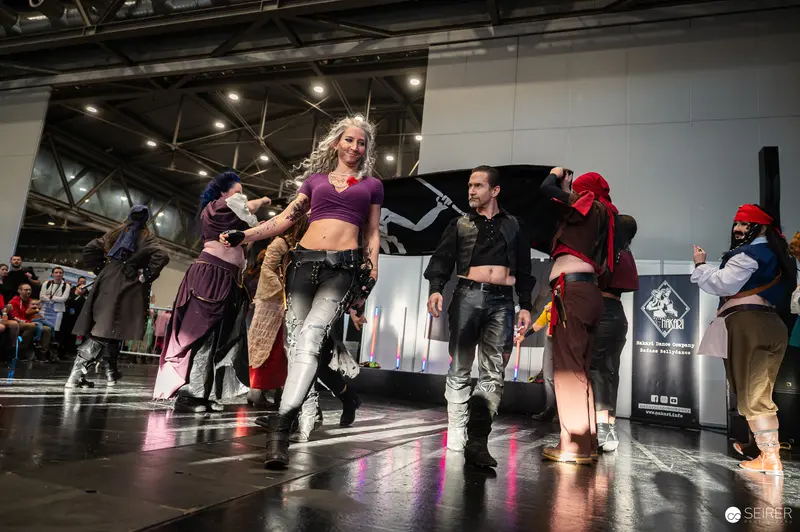 Vienna ComicCon 2024: Cosplayers Showcasing Diverse Performance Costumes on Main Stage