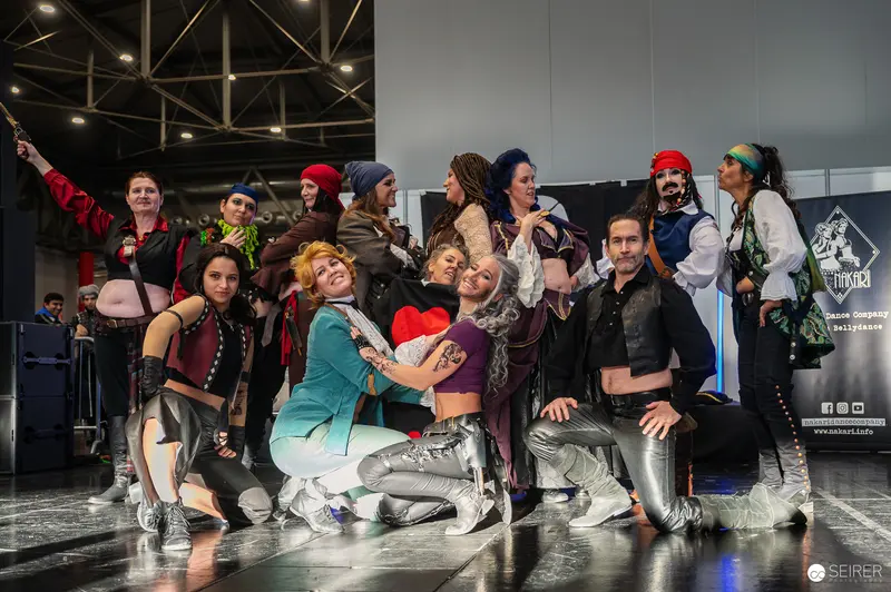 Vienna ComicCon 2024: Cosplay Performers Pose in Dynamic Group Photograph
