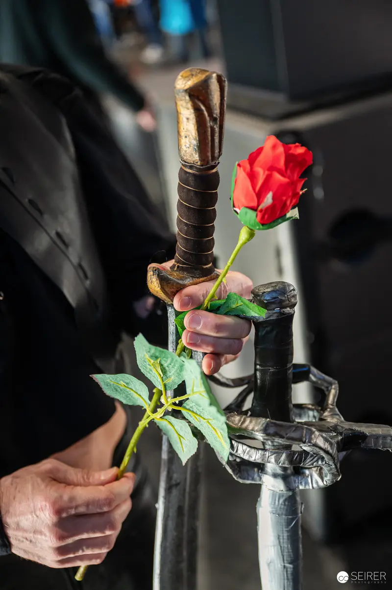 Red Rose Pierced on Medieval Fantasy Sword at Comic Convention