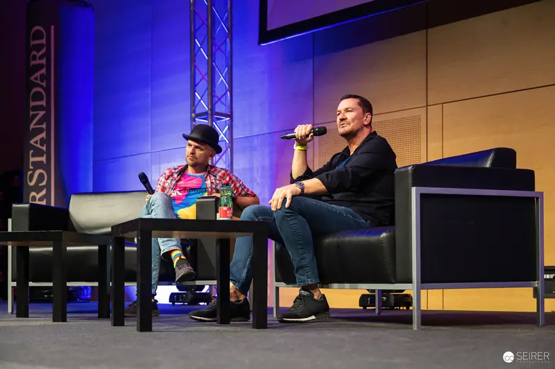 Speakers at Vienna ComicCon 2024 Panel Discussion on Stage
