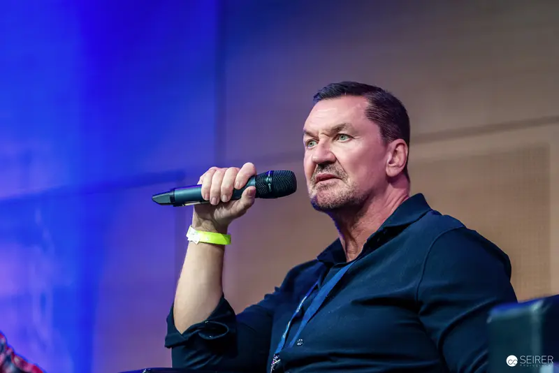 Singer Performing Intensely on Stage at Vienna ComicCon 2024