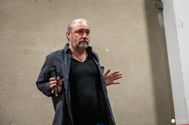 Intense Speaker Gesturing at Vienna ComicCon 2024 Event