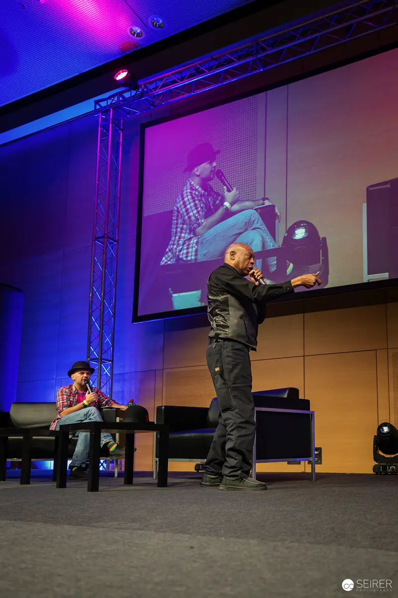 Speaker Presenting at Conference with Dynamic Stage Projection