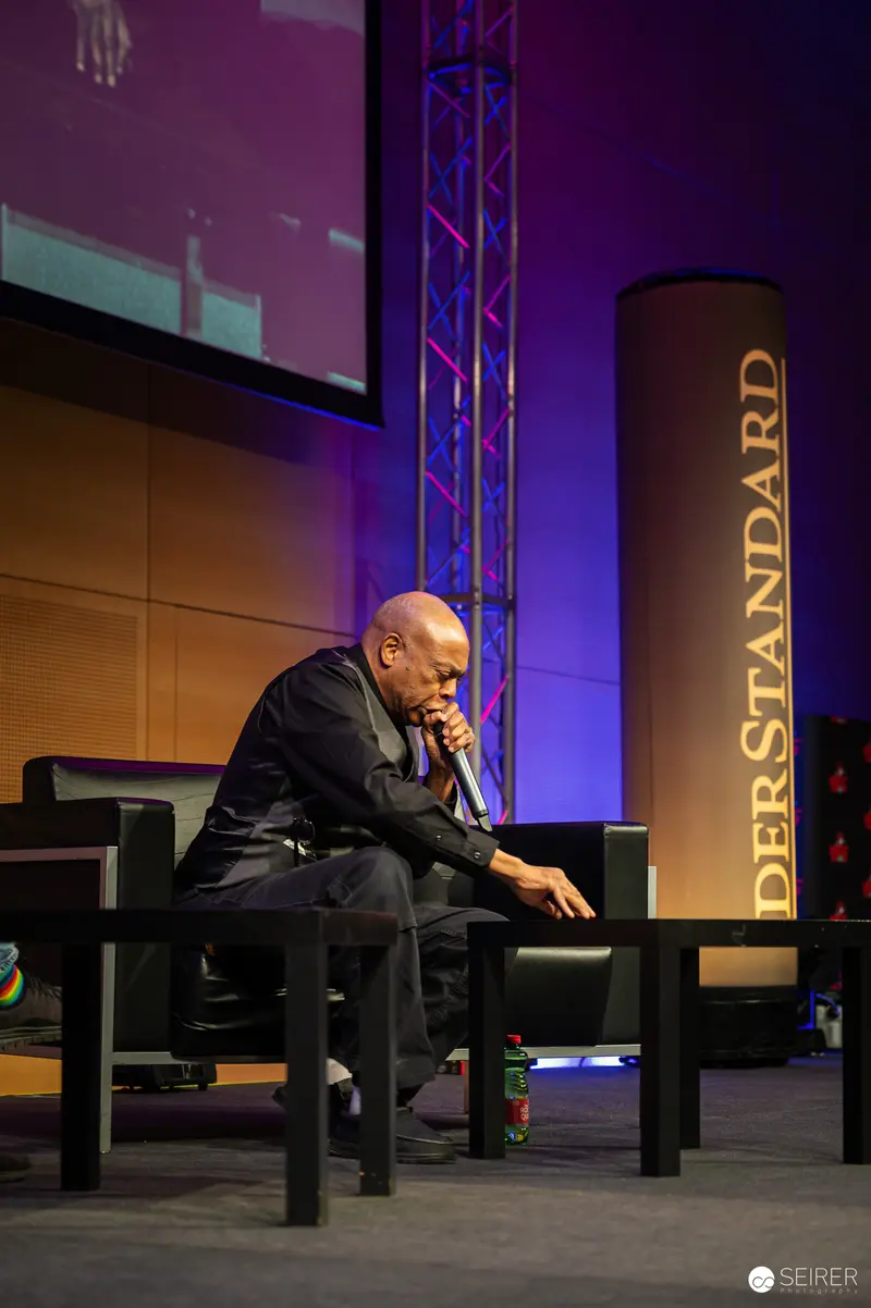 Distinguished Speaker on Stage at Der Standard Event in Austria