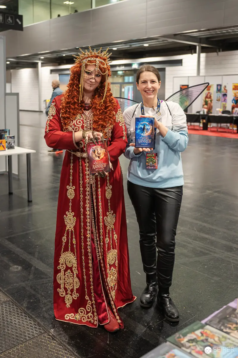 Elaborate Costumed Character and Staff Member at Vienna ComicCon 2024
