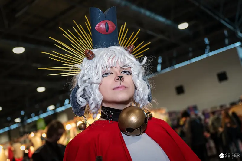 Cosplayer in Striking Eye-Catching Costume at Vienna ComicCon 2024