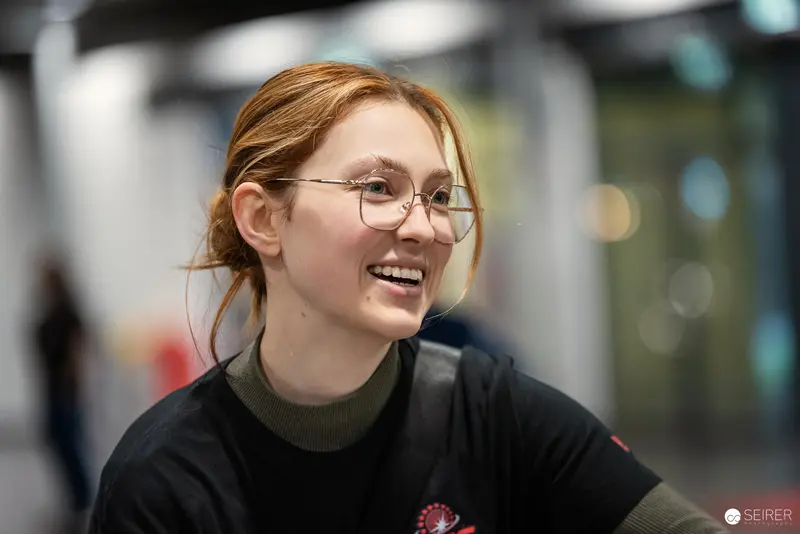 Excited Attendee at Vienna ComicCon 2024 Wearing Glasses and Black Shirt