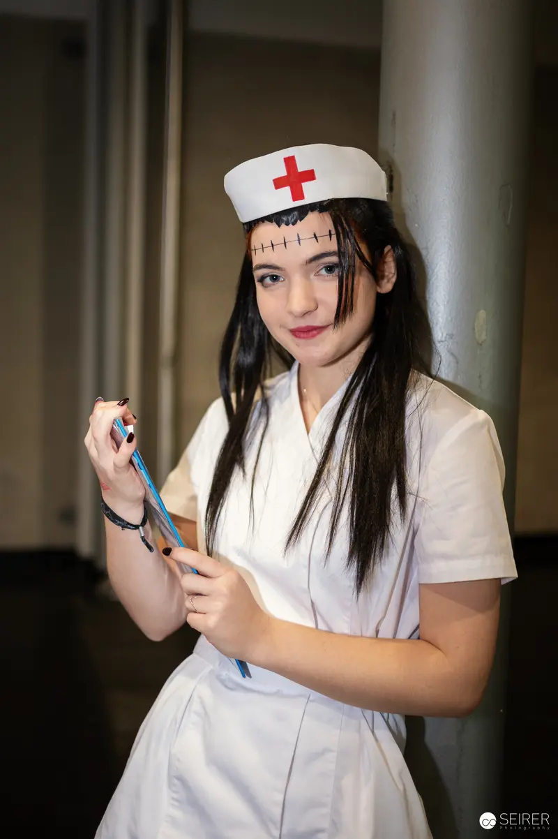 Nurse Cosplay at Vienna ComicCon 2024 in Stylized Healthcare Uniform