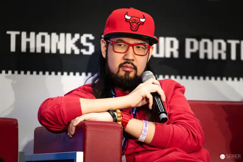 Red Bulls Fan in Bright Chicago-Themed Outfit at Speaking Event