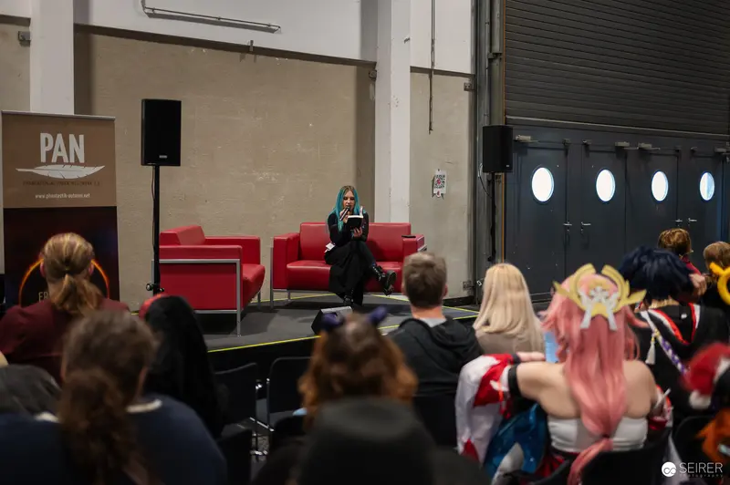 Speaker Presenting at Vienna ComicCon 2024 Convention Stage