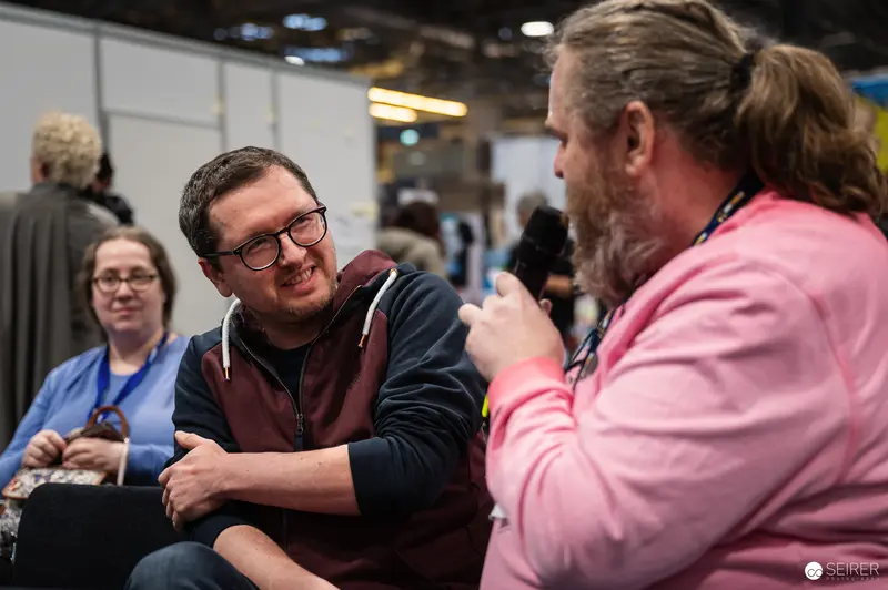 Attendees Engaged in Conversation at Vienna ComicCon 2024