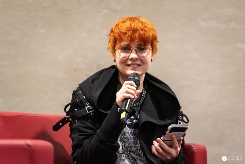 Vibrant Speaker at Vienna ComicCon 2024 in Engaging Panel Discussion