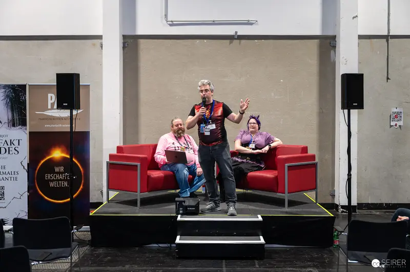 Vienna ComicCon 2024: Panel Discussion on Red Stage at Media Event