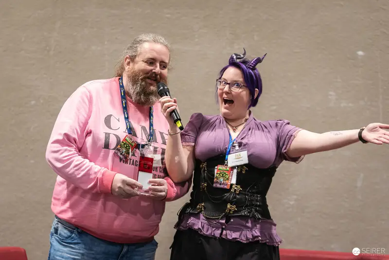 Comic Con Cosplay Duo Share Energetic Moment at Vienna Event