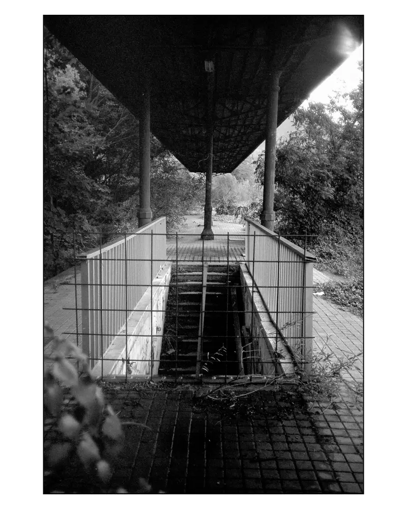 Sealed Underpass Staircase Beneath Disused Station Canopy, Villach–Grado Route, 2024