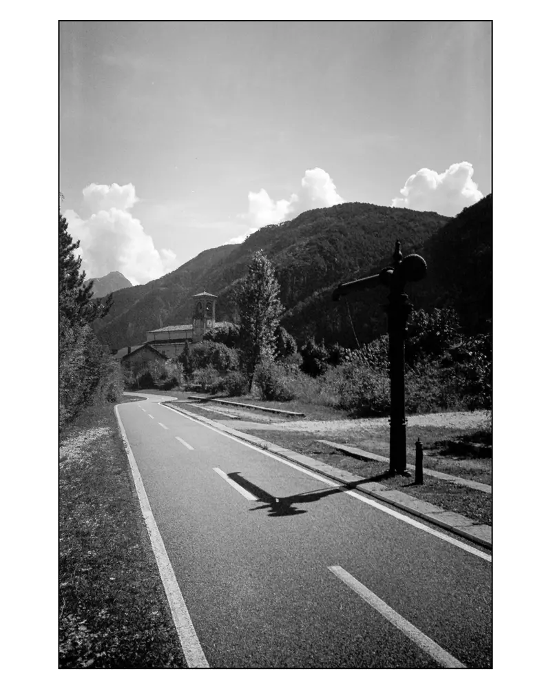 Cast-iron water crane beside Alpe-Adria cycle path on Villach–Grado ride, 2024