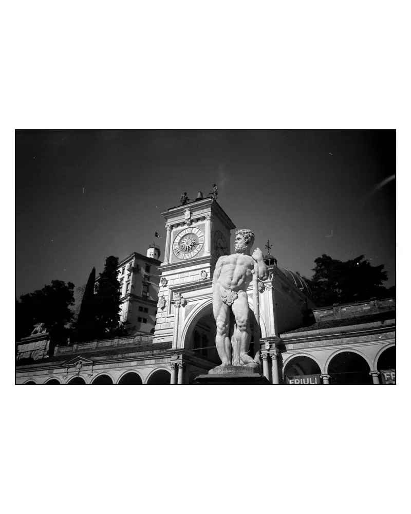 Hercules statue below the Torre dell'Orologio, Piazza della Libertà, Udine, Italy