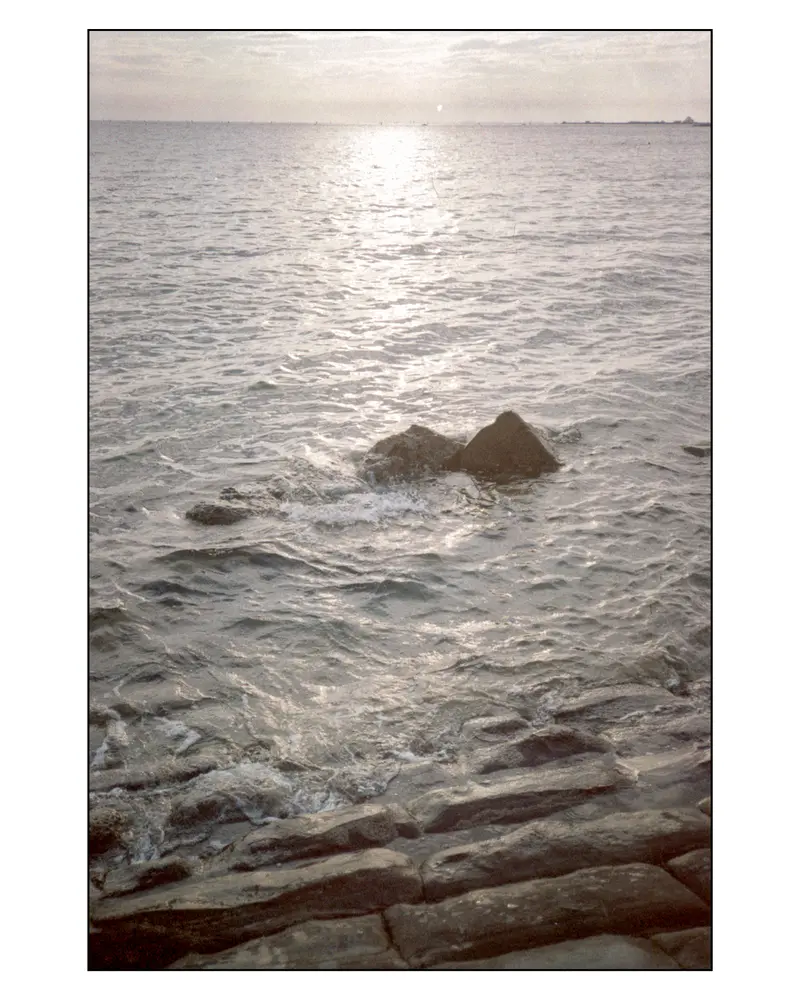 Adriatic Sea breaking over rocks along the Grado shoreline breakwater