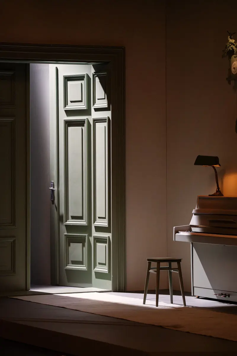 Minimalist Interior with Open Door and Dramatic Light Streaming In
