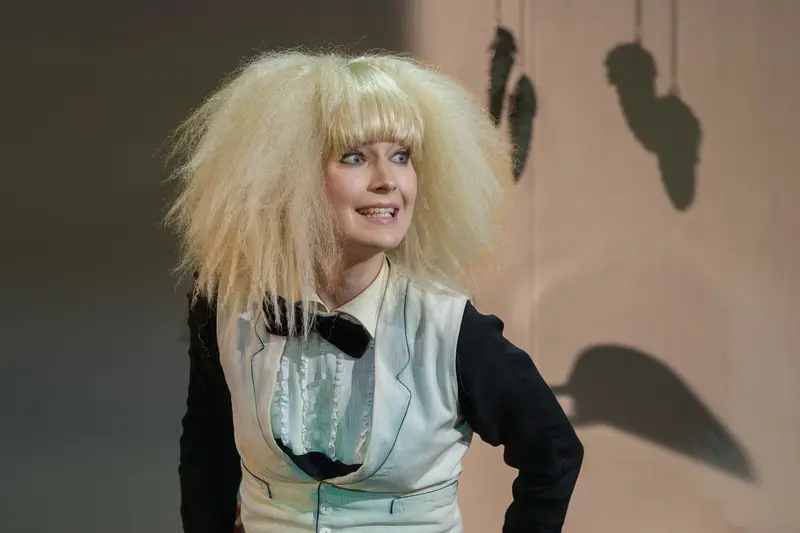 Kimberly Rydell in Theatrical Costume with Dramatic Hairstyle for "Die Affäre Rue de Lourcine"