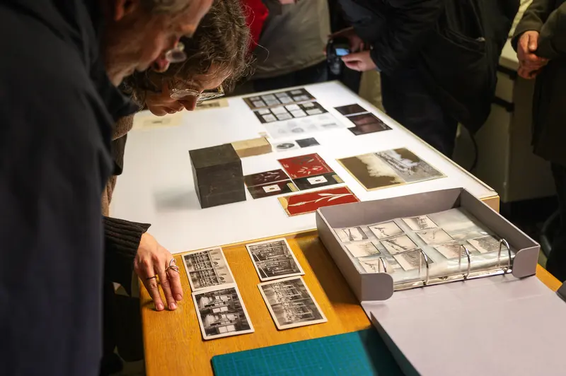 Archivists Examining Photographic Documents at Naturhistorisches Museum Wien