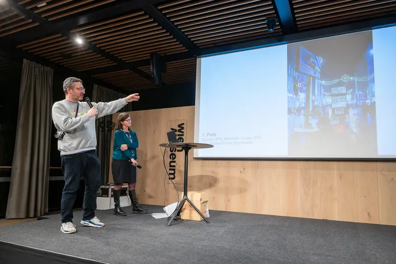 Design Conference Presentation with Projection Screen and Wooden Stage
