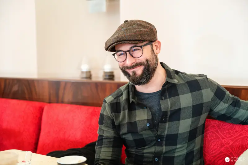 Falk Holzapfel Interview at Cafe Museum, Vienna, January 2025