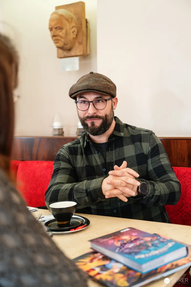 Falk Holzapfel in Conversation at Cafe Museum, Vienna