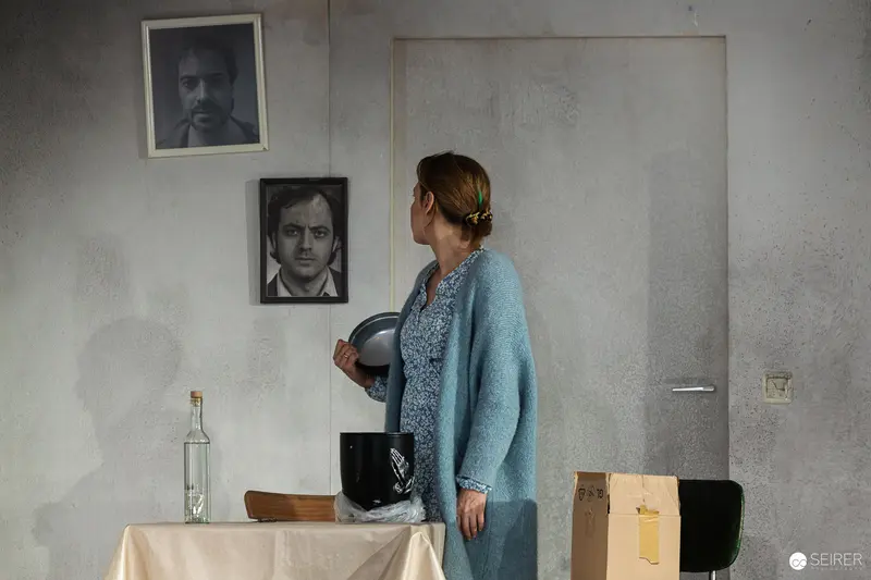 "Azur": Contemplative Moment During Theater Rehearsal with Performer in Blue Sweater