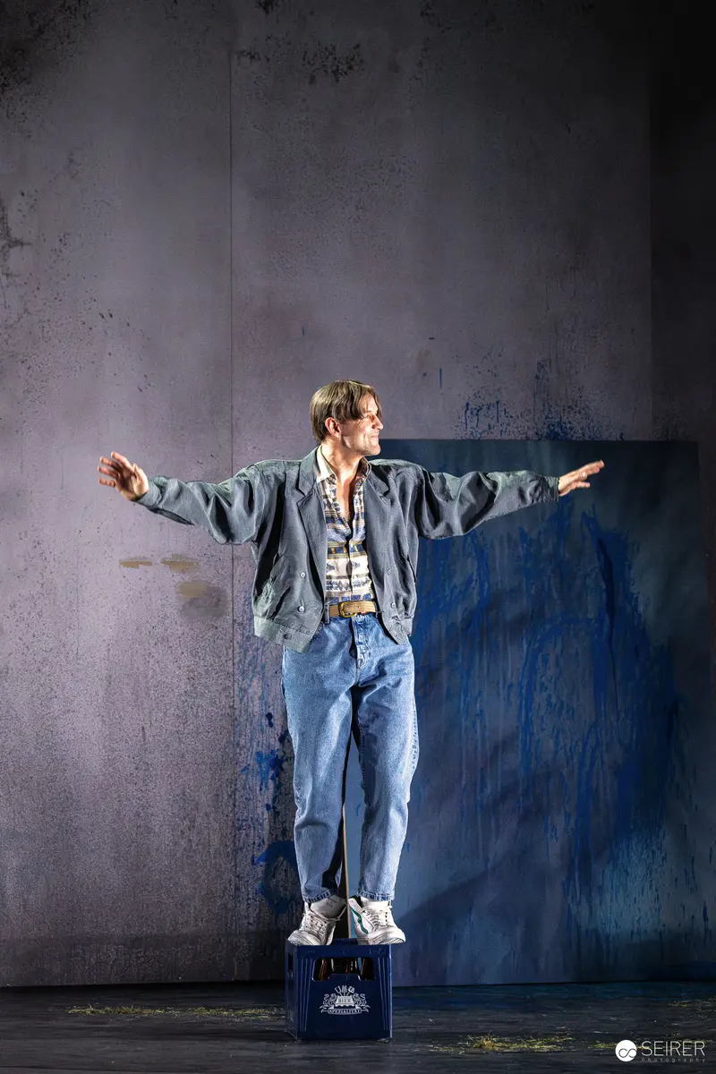 Actor in Blue Denim Performs in "Azur oder die Farbe von Wasser" at Theater in der Josefstadt