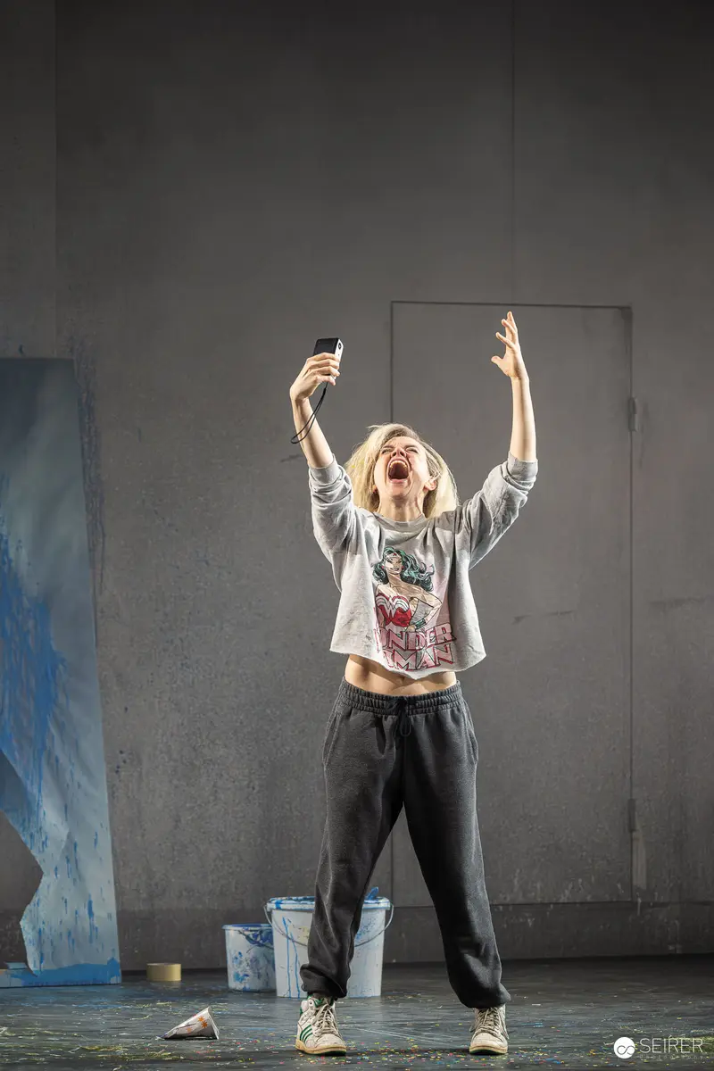 Martina Ebm Performing Dramatic Pose in Theater Rehearsal for "Azur oder die Farbe von Wasser"